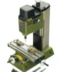 Dead Nuts Accurate Compact Desktop Milling Machine For Jewelry Crafting Electronics Repairs And Model Building With Rock Solid Cast Iron Base Smooth Adjustable Axes Heavy Duty Aluminum Table Slick Setup on a workbench.