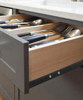 Lock In That Smooth Storage With Twelve Inch Bottom Mount Drawer Slides Heavy Duty Metal Sliding Rail Pair For Quiet Gliding Operation And Pro Level Install, open drawer with kitchen utensils.