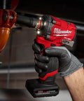 Person using M12 Fueltrade Stubby 1/2-Inch Impact Wrench Tool Only, Ultra-Compact 4.9-Inch Length, Up To 250 Ft-Lbs Nut-Busting Torque