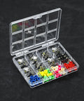 Premium Fingerboard Repair Kit Featuring 31 Millimeter Trucks Vibrant Multi Color Wheels And Heavy Duty Fasteners in a storage case.