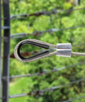 Rock Solid 304 Grade Stainless Steel Thimble Fits 1 16 Inch Wire Rope Cable forming a loop with a rustproof finish.