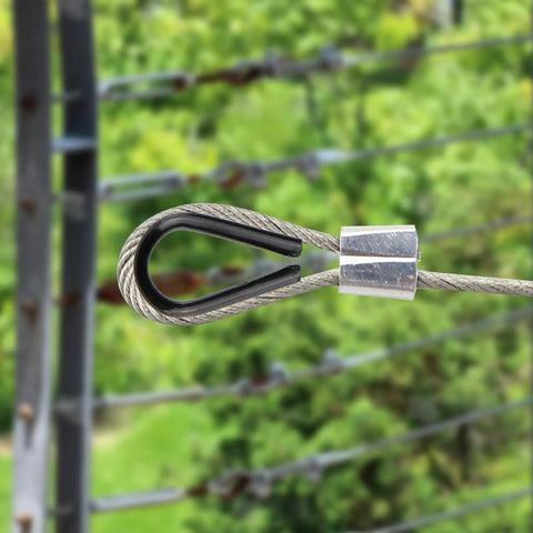 Rock Solid 304 Grade Stainless Steel Thimble Fits 1 16 Inch Wire Rope Cable forming a loop with a rustproof finish.