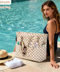 Woman by pool with Large Beach Tote Bag For Women Waterproof And Sandproof With Zipper And Wet Pocket Extra Spacious For Pool Gym Travel