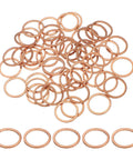 Heavy Duty Copper Crush Washers 50 Pack M16 16Mm ID 20Mm OD Thick Sealing Rings for Oil Drain Plugs laid out in a pile.