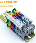 Colorful terminal blocks arranged on a metal DIN rail with DIN Rail End Stopper Bracket For 35mm Wide Guide Rail Terminal Blocks