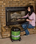 Person using All Purpose Ash Vacuum For Fireplaces And Grills With 10 Amp Power in brick fireplace cleaning ash