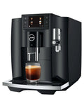 Next Level One Touch Automatic Coffee Maker In Slick Piano Black Finish Featuring Fresh Bean Grinding And Up To Seventeen Custom Drink Options For Home Setups Easy Peasy Controls Serve Up Straight Fire Espresso Every Single Day with glass of espresso.