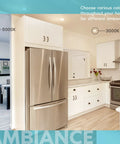 Modern kitchen with Lit Ultra Thin 4 Inch LED Recessed Light Kit, showing 5000K to 3000K color temperature options above a fridge.