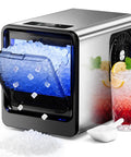 Countertop Nugget Ice Maker Serving Up 35 Pounds Daily In Five Flat For Silky Chewable Pebble Ice, with glass and ice.