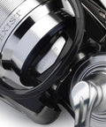 Close-up of Exist LT Right Hand 3000D Spinning Reel showing Monocoque Magnesium Body and Magsealed ATD Drag System.