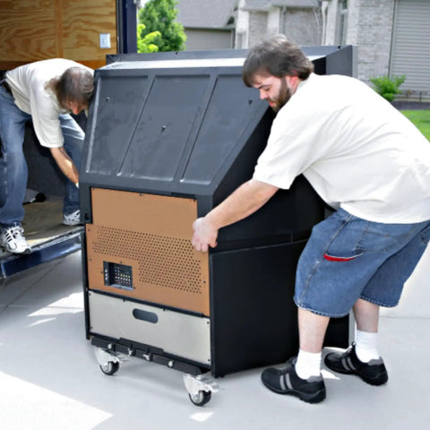 Two men using Beast Of A Heavy Duty Furniture Dolly With Reinforced Steel Frame 2200 Lbs Capacity Four Wheel Cart With Brakes outdoors