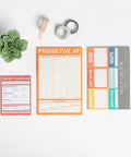 Paper Tantrum Nifty Note Pad Classic Edition With 50 Sheets, 4x5.25 Inches set with succulent and tape on desk