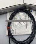 Top Shelf Current Sensor Compatible With Ev 108uc 112uc 118uc 130uc showing wires, connectors, and manual contents on a table.
