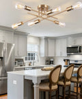 Dope Sputnik Chandelier Semi Flush Mount Ceiling Light With E26 Base 6 Light Brass in modern kitchen setting.