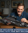 Man assembling Epic SR-71 Blackbird Building Set For Adults, 1775-Piece Military Recon Aircraft Model Kit with realistic details.