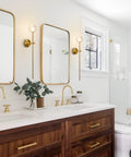 Mid Century Modern Gold Crystal Wall Sconce Set Of Two, Brushed Brass Long Tube Lighting With Vintage Clear Glass Shades in bathroom