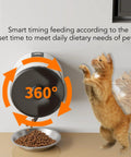 Wall Mounted Automatic Cat Feeder With WiFi Remote And 4 Liter Bin, anti-clog design, cat reaching for food bowl.