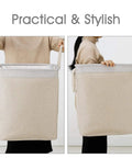 Stand Up Laundry Hamper With Handles And Built In Liner Two Pack Collapsible Laundry Basket in beige, held by person