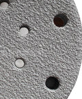 Get Ready To Rock Your Woodwork With A Pack Of 100 Versatile 6 Inch Sanding Discs showing heavy duty aluminum oxide grit surface and hole design.