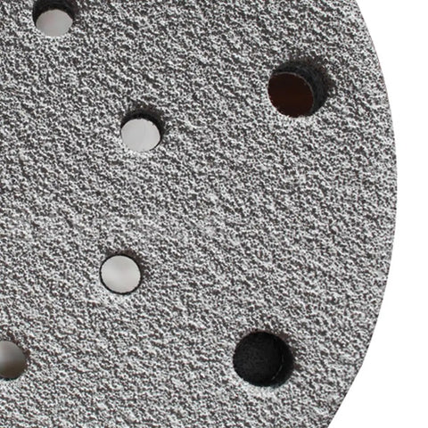 Get Ready To Rock Your Woodwork With A Pack Of 100 Versatile 6 Inch Sanding Discs showing heavy duty aluminum oxide grit surface and hole design.