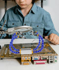 Four Arm Welding Station Helping Hands Soldering Stand With Base For PCB Repair Pro Grade Heavy Duty Clamp Tool in use on a PCB