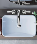 Overhead view of Two Handle Centerset Bathroom Faucet With High Arc Stainless Steel Spout Deck Plate And Pop Up Drain Chrome Finish.
