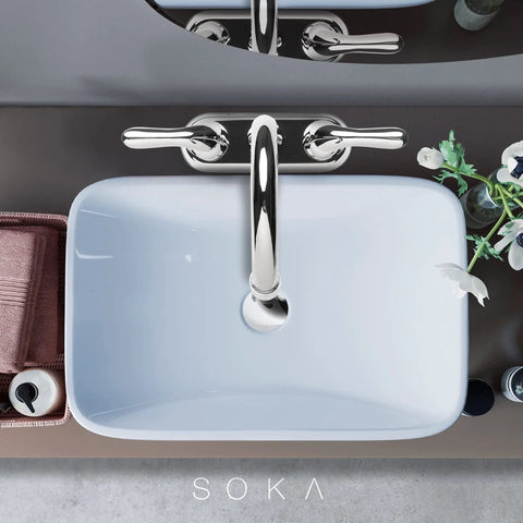 Overhead view of Two Handle Centerset Bathroom Faucet With High Arc Stainless Steel Spout Deck Plate And Pop Up Drain Chrome Finish.