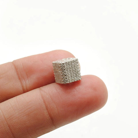 Hella Sparkling Diamond Charm Spacer Beads For Slick DIY Silver Jewelry Craft Projects With Smooth Grip, shown held between fingers.