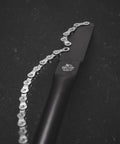 Pro Grade Cassette Removal Tool Kit for Shimano and Sram Freewheel Turner with chain whip on dark surface