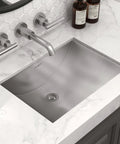 Stainless Steel Undermount Bathroom Sink 16 By 11 Inches 16 Gauge With Rectangular Shape And Brushed Finish Installed on Marble Countertop