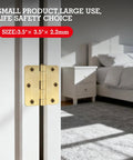 Tough As Nails Satin Brass Door Hinges Three Point Five Inches With Rounded Edges Smooth Swing Design close-up installation on white door.