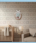 Vintage Hot Air Balloon Wall Art For Nursery And Kids Rooms, Framed Decor With Bow, Cozy Felt Balloon above baby crib and chair.