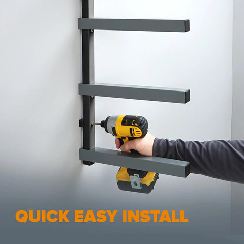 Man installing Must Have 4 Level Lumber Storage Rack For Garage Wall Mount Heavy Duty Metal Shelf in black gray finish.