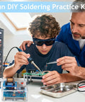 Teen learning with Electric Magnetic Transmitter Soldering Practice Kit For STEM Learning, supervised by adult, hands-on.