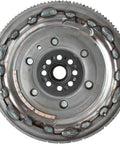 Heavy Duty Dual Mass Clutch Flywheel For 2003 To 2007 Infiniti G35 And 350Z 3 Point 5 V6 Engine top view showing steel face and components.