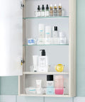 Sweet Clear Drawer Organizers, Slick Non Toxic Plastic Bins For Makeup And Vanity Gear, display in cabinet with skincare products.