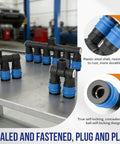Two Way Air Hose Splitter For Compressors One Quarter NPT Quick Connect Fittings displayed on a table in a workshop
