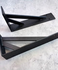 2 Pack Straight Up Heavy Duty Triangle Shelf Brackets Built Like A Tank For Wall Mounted Floating Shelves Rugged Carbon Steel Corner Supports With Mounting Hardware Matte Black 31.5 Inches close-up view on a flat surface.