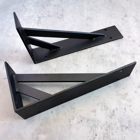 2 Pack Straight Up Heavy Duty Triangle Shelf Brackets Built Like A Tank For Wall Mounted Floating Shelves Rugged Carbon Steel Corner Supports With Mounting Hardware Matte Black 31.5 Inches close-up view on a flat surface.