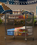 Heavy Duty Workhorse Two Tier Rolling Cart With Reinforced Wrought Iron Grid Shelves And Seamless Four Way Swivel Casters For No Hassle Storage Or Casual Serving In Polished White filled with food containers and boxes.
