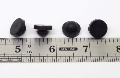 Push In Ridged SBR Rubber Bumper Foot Black, 9/16 Inch Diameter, 1/8 Inch Height, shown with ruler for scale