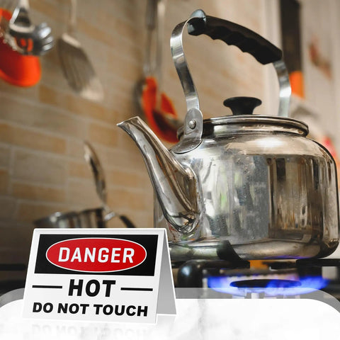 No Nonsense Aluminum Tent Warning Signs, Double Sided Heat Hazard Plates, 5 X 3.5 Inch with kettle and warning tag on stove.