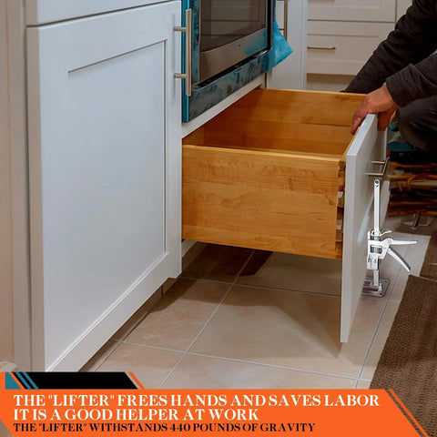 Two-piece silver labor-saving arm jack attached to a white kitchen cabinet door