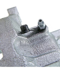 Brake caliper close-up: gray cast aluminum rear brake caliper with black anti-rattle clip.