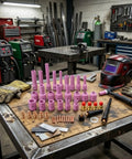 Solid Industrial Tig Torch Accessory Kit With Heavy Duty Consumables And Replacement Parts For Metal Fabrication And Repair Work To Keep Your Rig Running Smooth Without No Drama Or Breakdowns on workbench.