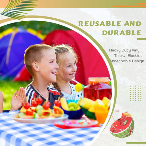 Children smiling at an outdoor picnic with a blue white checker tablecloth from Three Piece Picnic Table Cover Set With Fitted Tablecloth And Bench Covers For Outdoor Dining, Waterproof Vinyl Table Linen, Checker Blue White Pattern, Durable, Easy Cleanup, Perfect For Camping, Patio, BBQ And Indoor Use. Tents and colorful food visible in the background.