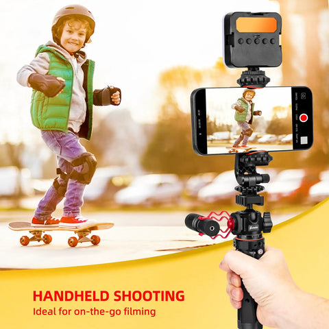 Do-It-All Travel Tripod Kit With One Quarter Inch Screw Adapter For Recording And Vlogging Includes Phone Clip Action Cam Adapter iPhone Vlogging Stand And 360 Degree Ball Head For Rock-Solid Flexible Shots showing handheld filming of a child on a skateboard
