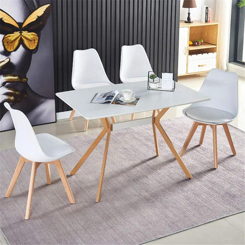 Slick Modern White Dining Table With Scratch Resistant Top And Heavy Duty Metal Bottom Shelf Clean Vibe Setup For Kitchen Hangouts Or Home Office in a stylish setting.