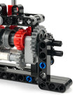 Close-up of 4 Speed Gearbox DIY Transmission Kit for Power Functions Building Blocks showing gears and connection points.
