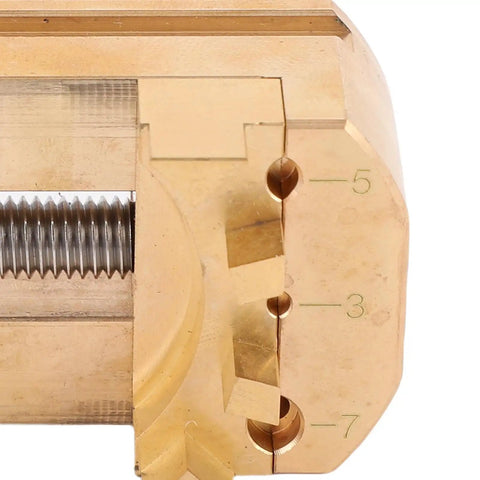 Close-up of Solid Mini Vise Clamp With Soft Copper Jaws For Watch Repair Jewelry Making Electronics And Woodworking Projects, showcasing its detailed mechanism.